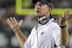 TAMPA, FL - SEPTEMBER 12: Coach Jim Leavitt of the University of South Florida Bulls directs play against the Kansas University Jayhawks at Raymond James Stadium on September 12, 2008 in Tampa, Florida.  (Photo by Al Messerschmidt/Getty Images) 