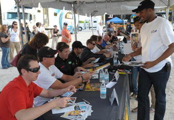 MIAMI BEACH, FL - NOVEMBER 18: Kyle Busch, Ron Hornaday Jr., Karl Edwards and other drivers and fans attend the NASCAR and Nationwide Fan Event at Lummus park on November 18, 2009 in Miami Beach, Florida.  (Photo by Marc Serota/Getty Images)