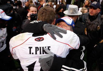 PITTSBURGH - DECEMBER 05: Tony Pike #15 is congratulated by head coach Brian Kelly of the Cincinnati Bearcats following their win against the University of Pittsburgh Panthers on December 5, 2009 at Heinz Field in Pittsburgh, Pennsylvania.  (Photo by Jared Wickerham/Getty Images)