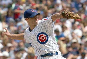 CHICAGO - JULY 26: Rich Harden #40 of the Chicago Cubs delivers the pitch during the game against the Cincinnati Reds on July 26, 2009 at Wrigley Field in Chicago, Illinois. (Photo by Jonathan Daniel/Getty Images) 