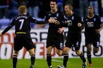WIGAN, ENGLAND - DECEMBER 5:   Sebastian Larsson (L) of Birmingham celebrates with his team mates after scoring during the Barclays Premier League Match Between Wigan Athletic & Birmingham City at the DW Stadium on December 5, 2009 in Wigan, England (Photo by Gary M. Prior/ Getty Images)