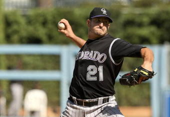 LOS ANGELES - OCTOBER 4: Pitcher Jason Marquis #21 of the Colorado Rockies throws a pitch against the Los Angeles Dodgers on October 4, 2009 at Dodger Stadium in Los Angeles, California.  The Dodgers won 5-3.  (Photo by Stephen Dunn/Getty Images)