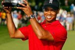 GRAND BLANC, MI - AUGUST 02:  Tiger Woods holds up the trophy after winning the final round of the Buick Open at Warwick Hills Golf and Country Club on August 2, 2009 in Grand Blanc, Michigan.  Woods won the tournament with a total of 20 under par.  (Photo by Chris Graythen/Getty Images)
