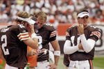 CLEVELAND - SEPTEMBER 28:  Offensive coordinator Bruce Arians of the Cleveland Browns talks to quarterbacks Tim Couch #2, Nate Hybl #8, and Kelly Holcomb #10 during a game against the Cincinnati Bengals at Cleveland Browns Stadium on September 28, 2003 in Cleveland, Ohio. The Bengals defeated the Browns 21-14.  (Photo by Phil Long/Getty Images)