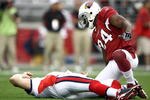 GLENDALE, AZ - OCTOBER 05: Starting Quarterback Trent Edwards #5 of the Buffalo Bills suffers a concussion after getting hit by Strong Safety Adrian Wilson #24 of the Arizona Cardinals during the first half of their NFL Game on October 5, 2008 at Stadium in Glendale, Arizona. (Photo by Donald Miralle/Getty Images)