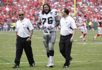 KANSAS CITY, MO - SEPTEMBER 20:  Robert Gallery #76 of the Oakland Raiders walks off the field during the game against the Kansas City Chiefs at Arrowhead Stadium on September 20, 2009 in Kansas City, Missouri. (Photo by Jamie Squire/Getty Images)