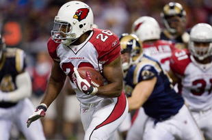 ST. LOUIS - NOVEMBER 22: Beanie Wells #26 of the Arizona Cardinals rushes against the St. Louis Rams at the Edward Jones Dome on November 22, 2009 in St. Louis, Missouri.  The Cardinals beat the Rams 21-13.  (Photo by Dilip Vishwanat/Getty Images)