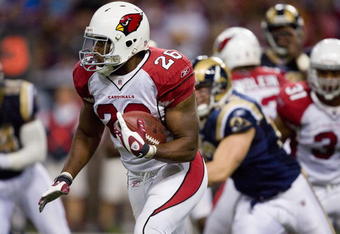 ST. LOUIS - NOVEMBER 22: Beanie Wells #26 of the Arizona Cardinals rushes against the St. Louis Rams at the Edward Jones Dome on November 22, 2009 in St. Louis, Missouri.  The Cardinals beat the Rams 21-13.  (Photo by Dilip Vishwanat/Getty Images)