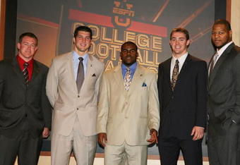 LAKE BUENA VISTA, FL - DECEMBER 10: (L to R) Heisman Trophy finalists Toby Gerhart of Stanford, Tim Tebow of Florida, Mark Ingram of Alabama, Colt McCoy and Ndamukong Suh of Nebraska pose after the Home Depot ESPNU College Football Awards at the Disney Boardwalk on December 10, 2009 in Lake Buena Vista, Florida.  (Photo by Doug Benc/Getty Images)