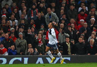 MANCHESTER, ENGLAND - DECEMBER 12:  Gabriel Agbonlahor of Aston Villa celebrates scoring the opening goal during the Barclays Premier League match between Manchester United and Aston Villa at Old Trafford on December 12, 2009 in Manchester, England.  (Photo by Clive Brunskill/Getty Images)