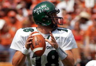 AUSTIN, TX - SEPTEMBER 2:  Quarterback Matt Phillips #18 of the North Texas Eagles drops back to pass against the Texas Longhorns on September 2, 2006 at Texas Memorial Stadium in Austin, Texas. The Longhorns defeated the Eagles 56-7.  (Photo by Ronald Martinez/Getty Images)