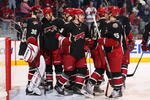 GLENDALE, AZ - DECEMBER 05:  The Phoenix Coyotes congratulate goaltender Ilya Bryzgalov #30 after defeating the Ottawa Senators in the NHL game at Jobing.com Arena on December 5, 2009 in Glendale, Arizona.  The Coyotes defeated the Senators 3-2.  (Photo by Christian Petersen/Getty Images)