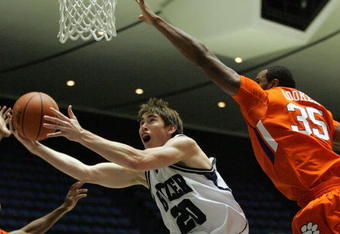 ANAHEIM, CA - NOVEMBER 29:  Gordon Hayward #20 of Butler lays up a shot against Trevor Booker #35 of Clemson in the first half during the 76 Classic at Anaheim Convention Center on November 29, 2009 in Anaheim, California.  (Photo by Victor Decolongon/Getty Images)