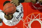 LOUISVILLE, KY - MARCH 04:  Earl Clark #5 of the Louisville Cardinals blocks the shot of Larry Davis #35 of the Seton Hall Pirates in a Big East Conference game on March 4, 2007 at Freedom Hall in Louisville, Kentucky.  Louisville won  86-71. (Photo by Andy Lyons/Getty Images)