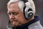 GREEN BAY, WI - NOVEMBER 15: Head coach Wade  Phillips of the Dallas Cowboys reacts as his offense comes off the field during a game against the Green Bay Packers at Lambeau Field on November 15, 2009 in Green Bay, Wisconsin. The Packers defeated the Cowboys 17-7. (Photo by Jonathan Daniel/Getty Images)
