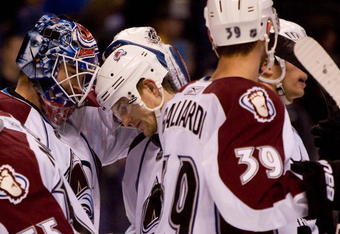ST. LOUIS - DECEMBER 7: Peter Budaj #31 of the Colorado Avalanche is congratulated after shutting out the St. Louis Blues at the Scottrade Center on December 7, 2009 in St. Louis, Missouri.  The Avalanche beat the Blues 4-0.  (Photo by Dilip Vishwanat/Getty Images)