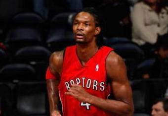 ATLANTA - DECEMBER 02:  Chris Bosh #4 of the Toronto Raptors against the Atlanta Hawks at Philips Arena on December 2, 2009 in Atlanta, Georgia.  NOTE TO USER: User expressly acknowledges and agrees that, by downloading and/or using this Photograph, User is consenting to the terms and conditions of the Getty Images License Agreement.  (Photo by Kevin C. Cox/Getty Images)