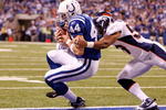 INDIANAPOLIS - DECEMBER 13:  Dallas Clark #44 of the Indianapolis Colts catches a toucdown pass while defended by Wesley Woodyard #59 of the Denver Broncos during the NFL game at Lucas Oil Stadium on December 13, 2009 in Indianapolis, Indiana.  The Colts won 28-16.  (Photo by Andy Lyons/Getty Images)