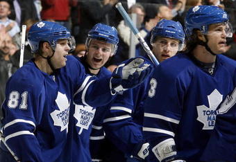 TORONTO - DECEMBER 7:  Phil Kessel #81and  Matt Stajan #14 of the Toronto Maple Leafs celebrate goal during action against the Atlanta Thrashers December 7, 2009 at the Air Canada Centre in Toronto, Ontario, Canada. (Photo by Abelimages/Getty Images)