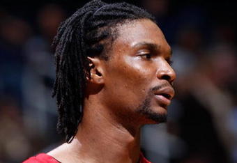 ATLANTA - DECEMBER 02:  Chris Bosh #4 of the Toronto Raptors against the Atlanta Hawks at Philips Arena on December 2, 2009 in Atlanta, Georgia.  NOTE TO USER: User expressly acknowledges and agrees that, by downloading and/or using this Photograph, User is consenting to the terms and conditions of the Getty Images License Agreement.  (Photo by Kevin C. Cox/Getty Images)
