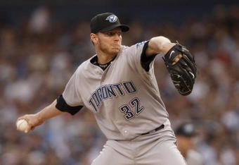NEW YORK _ JUNE 3:  Roy Halladay #32 of the Toronto Blue Jays delivers a pitch during the game against the New York Yankees on June 3, 2008 at Yankee Stadium in the Bronx borough of New York City. (Photo by: Nick Laham/Getty Images)