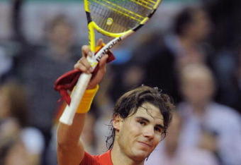 BARCELONA, SPAIN - DECEMBER 06:  Rafael Nadal of Spain salutes the crowd after beating Jan Hajek of Czech Republic in the fourth match of the Davis Cup final  between Spain and Czech Republic at the Palau Sant Jordi stadium on December 6, 2009 in Barcelona, Spain.  (Photo by Denis Doyle/Getty Images)