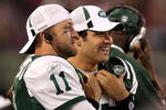 EAST RUTHERFORD, NJ - SEPTEMBER 03:  Quarterback Mark Sanchez #6 of the New York Jets talks with teammate Kellen Clemens #11 during their game against the Philadelphia Eagles at Giants Stadium on September 3, 2009 in East Rutherford, New Jersey.  (Photo by Jim McIsaac/Getty Images)