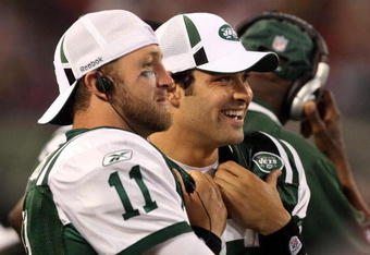EAST RUTHERFORD, NJ - SEPTEMBER 03:  Quarterback Mark Sanchez #6 of the New York Jets talks with teammate Kellen Clemens #11 during their game against the Philadelphia Eagles at Giants Stadium on September 3, 2009 in East Rutherford, New Jersey.  (Photo by Jim McIsaac/Getty Images)