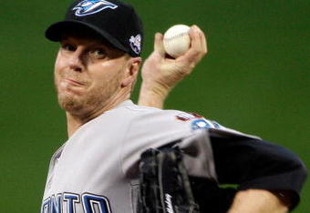 ST LOUIS, MO - JULY 14:  American League All-Star Roy Halladay of the Toronto Blue Jays pitches during the 2009 MLB All-Star Game at Busch Stadium on July 14, 2009 in St Louis, Missouri.  (Photo by Morry Gash-Pool/Getty Images)