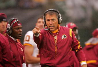 OAKLAND, CA - DECEMBER 13:  Head coach Jim Zorn of the Washington Redskins walks the sidelines during their game against the Oakland Raiders at Oakland-Alameda County Coliseum on December 13, 2009 in Oakland, California.  (Photo by Ezra Shaw/Getty Images)