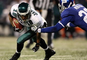 EAST RUTHERFORD, NJ - DECEMBER 13:  DeSean Jackson #10 of the Philadelphia Eagles runs with the ball against Corey Webster #23 of the New York Giants at Giants Stadium on December 13, 2009 in East Rutherford, New Jersey.  (Photo by Nick Laham/Getty Images)