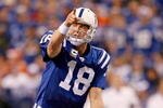 INDIANAPOLIS - DECEMBER 13:  Peyton Manning #18 of the Indianapolis Colts gives instructions to his team at the line of scrimmage  during the NFL game against the Denver Broncos at Lucas Oil Stadium on December 13, 2009 in Indianapolis, Indiana. The Colts won 26-18.  (Photo by Andy Lyons/Getty Images)