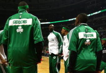 CHICAGO - DECEMBER 12: Members of the Boston Celtics jump around after player introductions before a game against the Chicago Bulls at the United Center on December 12, 2009 in Chicago, Illinois. NOTE TO USER: User expressly acknowledges and agrees that, by downloading and/or using this Photograph, User is consenting to the terms and conditions of the Getty Images License Agreement. (Photo by Jonathan Daniel/Getty Images)