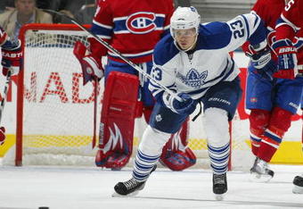 TORONTO, ON - OCTOBER 1:  Alexei Ponikarovsky #23 of the Toronto Maple leafs skates back up ice in a game against the Montreal Canadiens on October 1, 2009 at the Air Canada Centre in Toronto, Ontario. The Canadiens dfeated the Leafs 4-3 in overtime. (Photo by Claus Andersen/Getty Images)