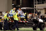 ARLINGTON, TX - DECEMBER 13:  Linebacker DeMarcus Ware #94 of the Dallas Cowboys is taken off the field after a neck sprain against the San Diego Chargers at Cowboys Stadium on December 13, 2009 in Arlington, Texas.  (Photo by Ronald Martinez/Getty Images)