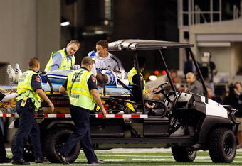 ARLINGTON, TX - DECEMBER 13:  Linebacker DeMarcus Ware #94 of the Dallas Cowboys is taken off the field after a neck sprain against the San Diego Chargers at Cowboys Stadium on December 13, 2009 in Arlington, Texas.  (Photo by Ronald Martinez/Getty Images)