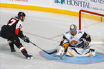 BUFFALO, NY - NOVEMBER 06: Ryan Miller #30 of the Buffalo Sabres makes a save on a deflection by Jeff Carter #17 of the Philadelphia Flyers at HSBC Arena on November 6, 2009 in Buffalo, New York.  (Photo by Rick Stewart/Getty Images)