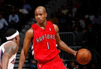 ATLANTA - DECEMBER 02:  Jarrett Jack #1 of the Toronto Raptors against the Atlanta Hawks at Philips Arena on December 2, 2009 in Atlanta, Georgia.  NOTE TO USER: User expressly acknowledges and agrees that, by downloading and/or using this Photograph, User is consenting to the terms and conditions of the Getty Images License Agreement.  (Photo by Kevin C. Cox/Getty Images)