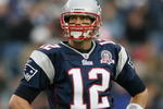 FOXBORO, MA - DECEMBER 13:  Tom Brady #12 of the New England Patriots reacts after he threw an interception in the first quarter against the Carolina Panthers on December 13, 2009 at Gillette Stadium in Foxboro, Massachusetts.  (Photo by Elsa/Getty Images)