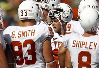 WACO, TX - NOVEMBER 14:  Quarterback Colt McCoy #12 of the Texas Longhorns leads his team in the huddle in the first half against the Baylor Bears on November 14, 2009 at Floyd Casey Stadium in Waco, Texas.  The Longhorns beat the Bears 47-14.  (Photo by Tom Pennington/Getty Images)