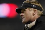 30 Dec 2001:  Head coach Jon Gruden of the Oakland Raiders looks less than thrilled after the offense turned the ball over on downs to the Denver Broncos late in the fourth quarter at Mile High Stadium in Denver, Colorado.  The Broncos won 23-17.  DIGITAL IMAGE Mandatory Credit: Brian Bahr/Getty Images