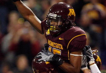 MINNEAPOLIS - NOVEMBER 01:  Traye Simmons #15 of the Minnesota Golden Gophers celebrates his interception for a touchdown for a 14-10 lead with Lee Campbell #30 over the Northwestern Wildcats during the second quarter at the Hubert H.Humphrey Metrodome on November 1, 2008 in Minneapolis, Minnesota  (Photo by Harry How/Getty Images)