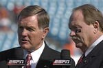 JACKSONVILLE, FL - DECEMBER 1: ESPN commentators Bob Griese (left) and Paul Maguire report from the sidelines as the Boston College Eagles battle the Virginia Tech Hokies in the ACC Championship Game at Jacksonville Municipal Stadium on December 1, 2007 in Jacksonville, Florida.  The Hokies won 30 - 16.  (Photo by Al Messerschmidt/Getty Images)