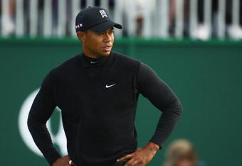 TURNBERRY, SCOTLAND - JULY 17:  Tiger Woods of USA leaves the 18th green during round two of the 138th Open Championship on the Ailsa Course, Turnberry Golf Club on July 17, 2009 in Turnberry, Scotland.  (Photo by Richard Heathcote/Getty Images)