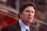 GLENDALE, AZ - OCTOBER 22:  Head coach Mike Babcock of the Detroit Red Wings watches from the bench during the NHL game against the Phoenix Coyotes at Jobing.com Arena on October 22, 2009 in Glendale, Arizona. The Coyotes defeated the Red Wings 3-2 in overtime.  (Photo by Christian Petersen/Getty Images)