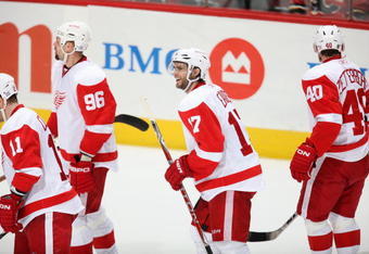 CALGARY, CANADA - OCTOBER 31: Patrick Eaves #17 of the Detroit Red Wings smiles after a play during a break in game action against the Calgary Flames  on October 31, 2009 at the Pengrowth Saddledome in Calgary, Alberta, Canada. The Red Wings defeated the Flames 3-1. (Photo by Dale MacMillan/Getty Images)