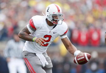 ANN ARBOR, MI - NOVEMBER 21:  Quarterback Terrelle Pryor #2 of the Ohio State Buckeyes hands off the ball during the game against the Michigan Wolverines on November 21, 2009 at Michigan Stadium in Ann Arbor, Michigan. Ohio State won the game 21-10. (Photo by Gregory Shamus/Getty Images)