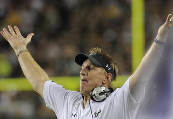 TAMPA, FL - SEPTEMBER 12: Coach Jim Leavitt of the University of South Florida Bulls signals a score against the Kansas University Jayhawks at Raymond James Stadium on September 12, 2008 in Tampa, Florida.  (Photo by Al Messerschmidt/Getty Images)