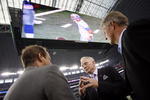 ARLINGTON, TX - AUGUST 21:  Dallas Cowboys team owner Jerry Jones (center) talks with two unidentified individuals prior to a preseason game at Dallas Cowboys Stadium on August 21, 2009 in Arlington, Texas. (Photo by Tom Pennington/Getty Images) 