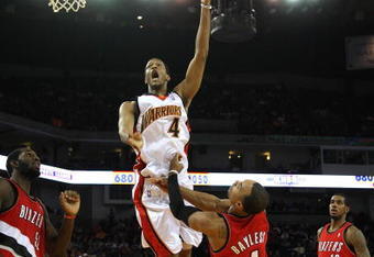 OAKLAND, CA - NOVEMBER 20:  Anthony Randolph #4 of the Golden State Warriors shoots against the Portland Trail Blazers during an NBA game at Oracle Arena on November 20, 2009 in Oakland, California.  (Photo by Jed Jacobsohn/Getty Images)